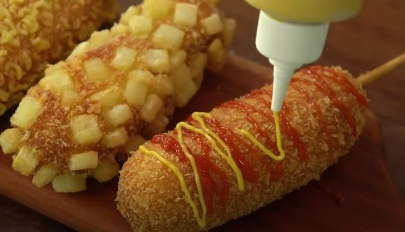 topping corn dog